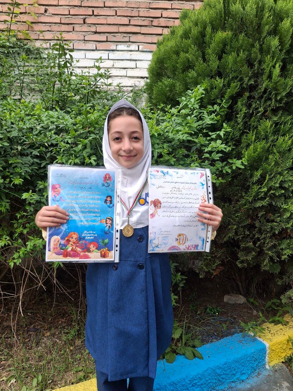 هدیه رضایی دانش آموز پایه سوم مقام اول شنا رده سنی 9 سال